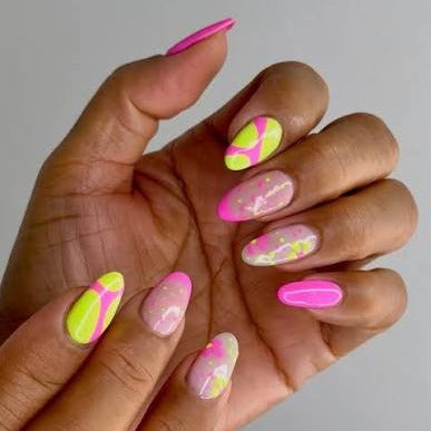 Dipping powder nails on two hands in neon pink and yellow